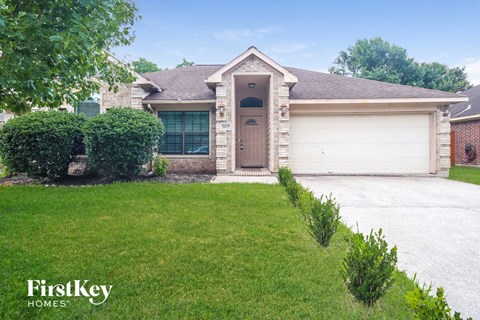 a house with a driveway and a garage door