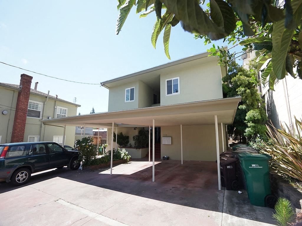 a house with a car parked in front of it