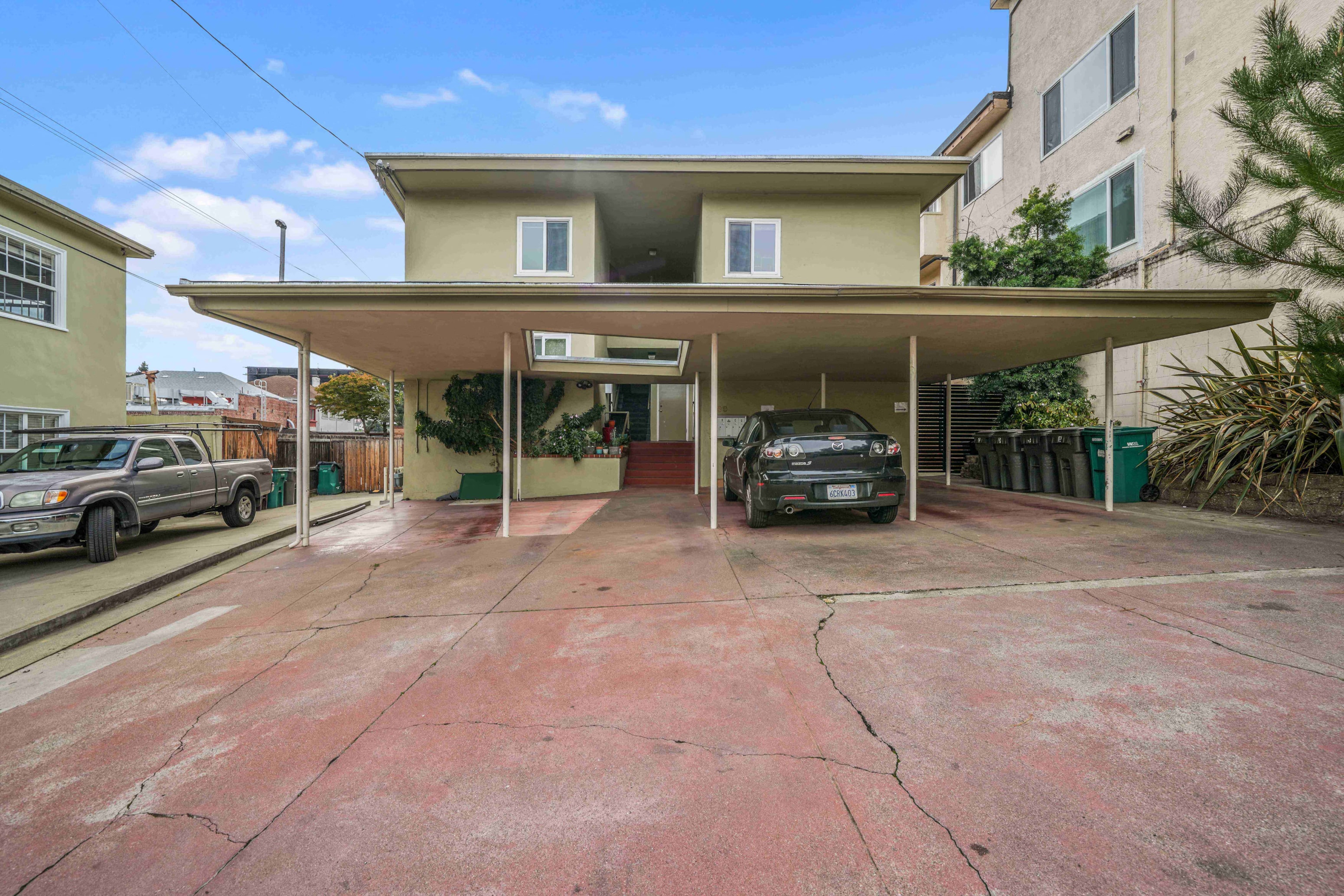 a parking garage with a car parked in it