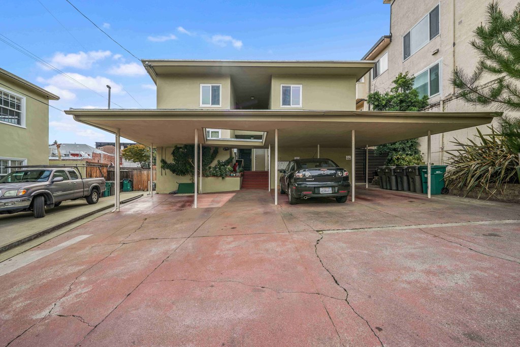 a parking garage with a car parked in it