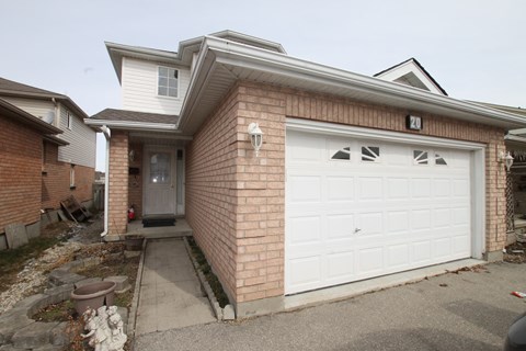 A two-car garage is attached to a house.