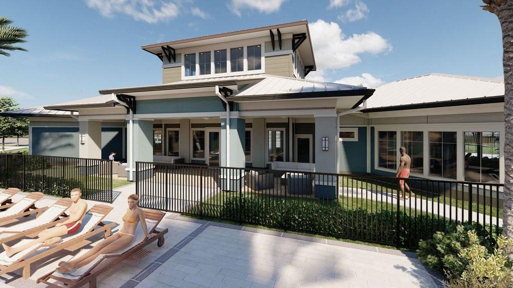a house with a porch and a patio with chairs