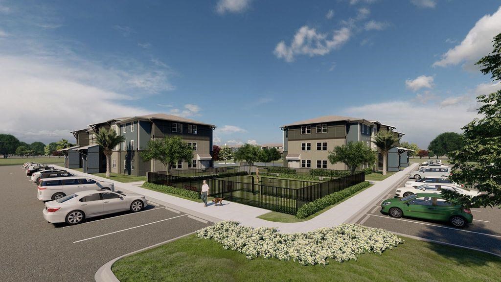 a rendering of a neighborhood with cars parked in a parking lot