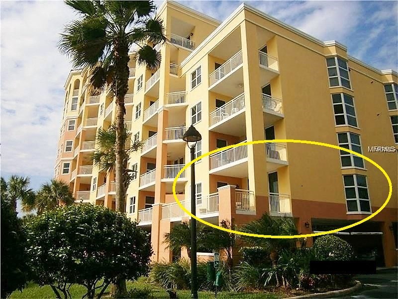 a yellow building with a yellow circle around it