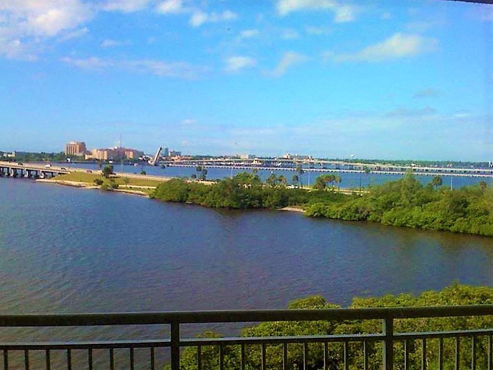 a view of a body of water and a bridge