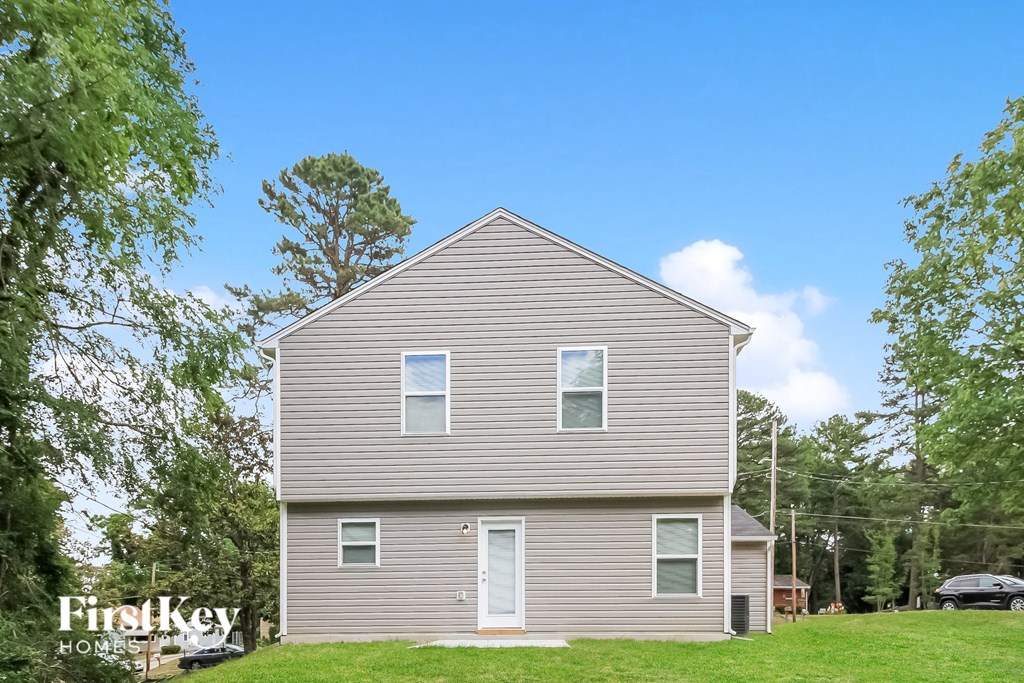 side view of a house with a blue sky in the background