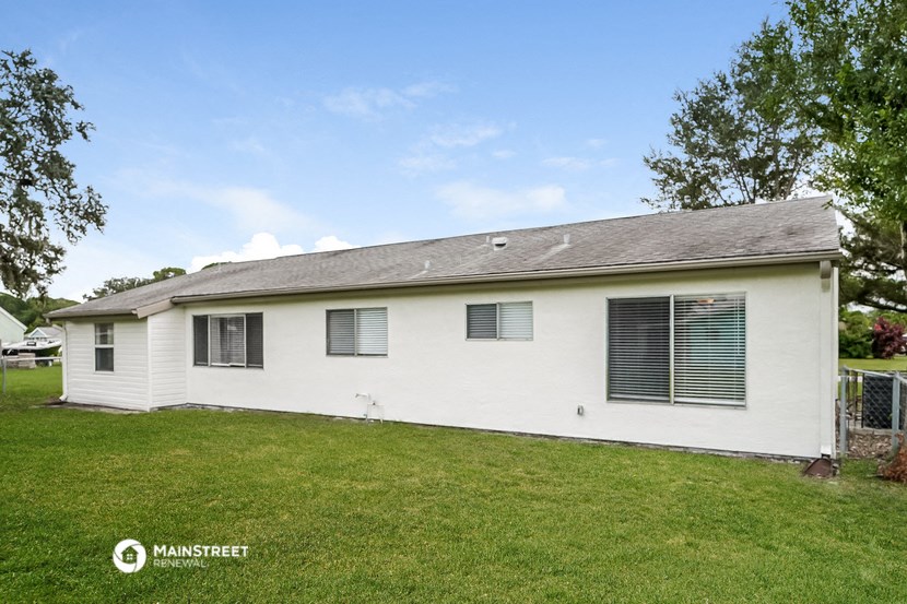 an old with green grass and a yard