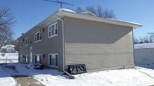 the front of a house in the snow
