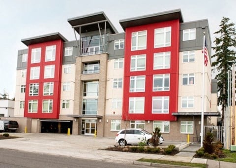 a building with a car parked in front of it