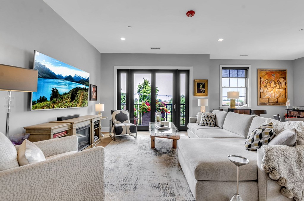 a living room with a couch and a tv