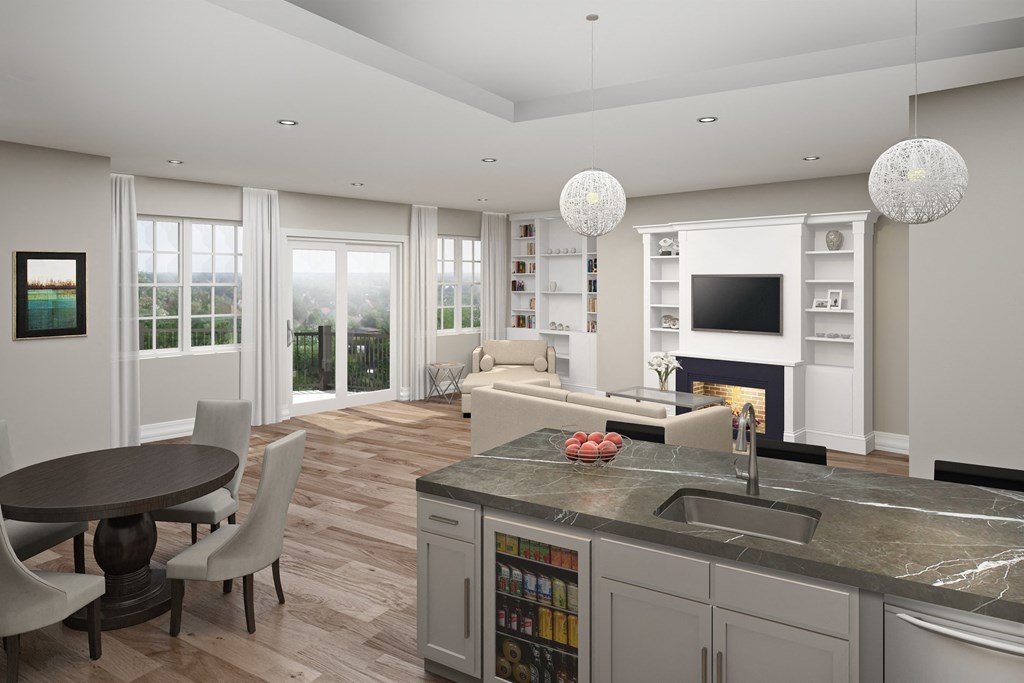 a living room with a kitchen and a dining room