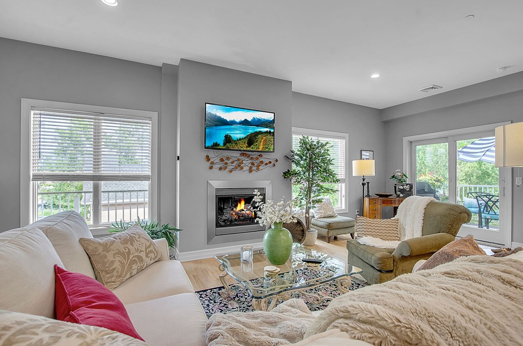 a living room with a couch and a fireplace