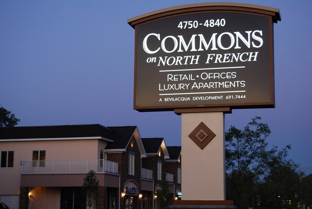 a sign that readscommons real offices luxury apartments