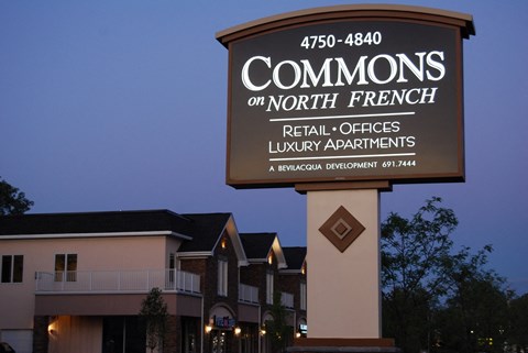a sign that readscommons real offices luxury apartments
