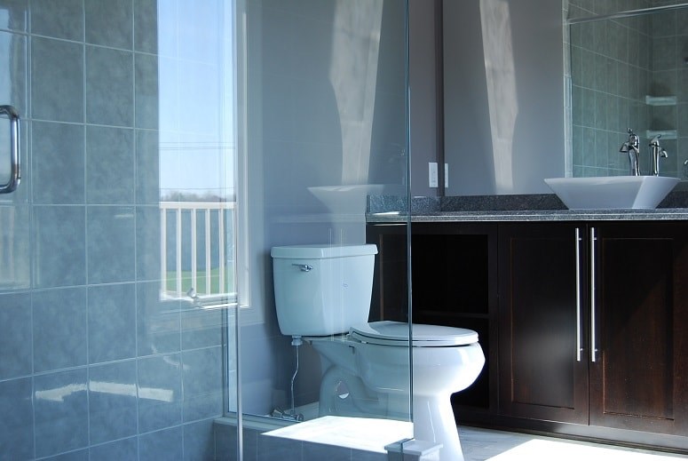 a bathroom with a toilet and a sink