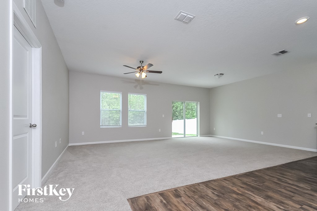 the spacious living room is clean and ready for you to use