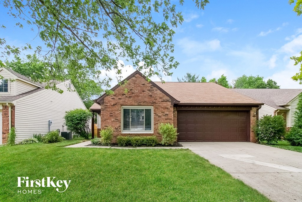 A house with a garage is for sale by FirstKey Homes.