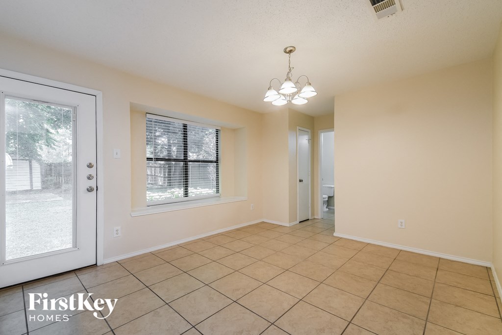 the living room and dining room are spacious and clean