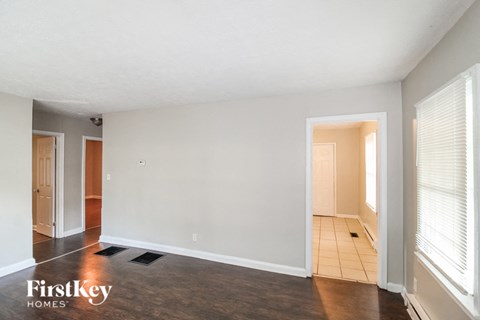 A room with a FirstKey Homes logo on the floor.