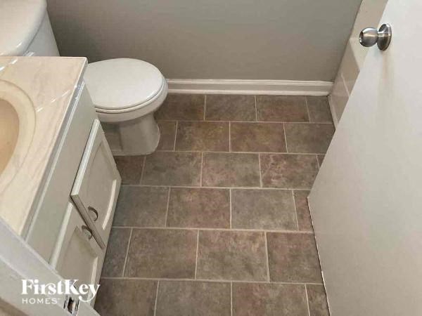 a small bathroom with a toilet and a sink