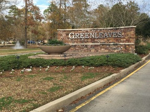 a sign for green beavers on the side of a street