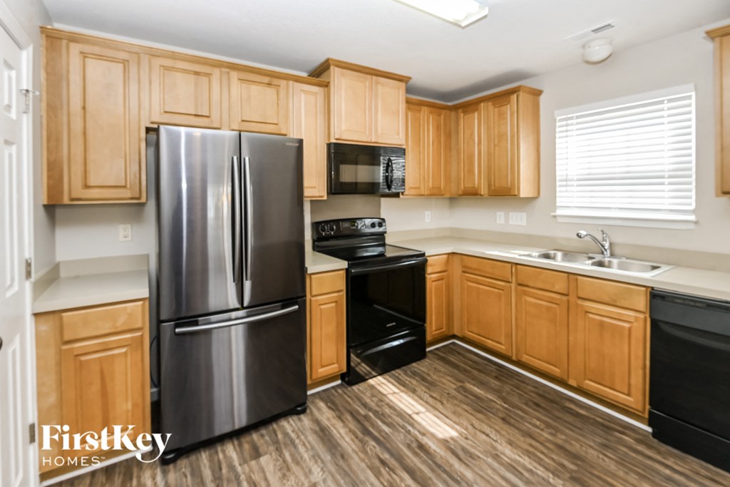 the preserve at ballantyne commons 2400 kitchen with stainless steel refrigerator