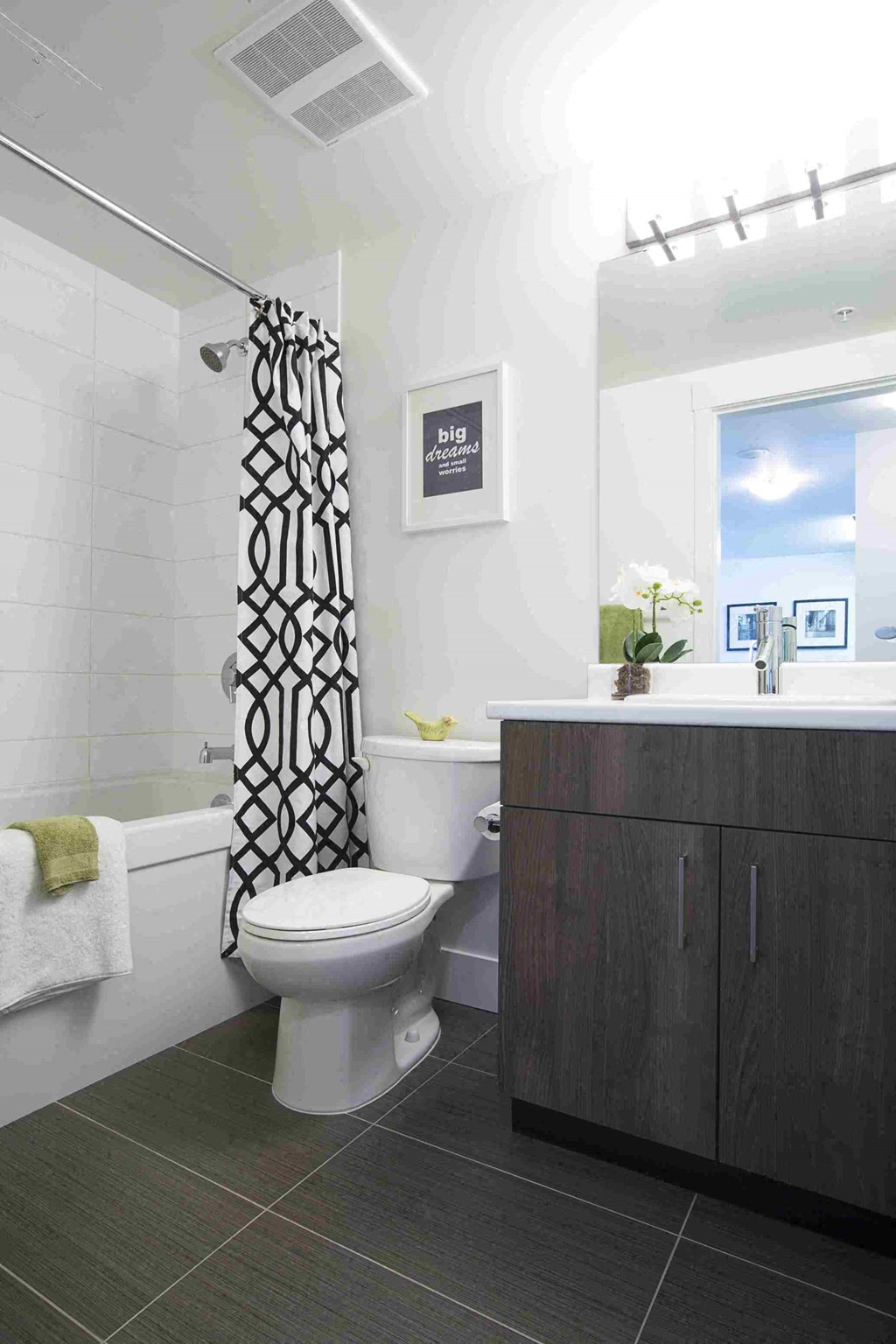 a bathroom with a toilet and a sink #victoria #rentals #affordable #appartments