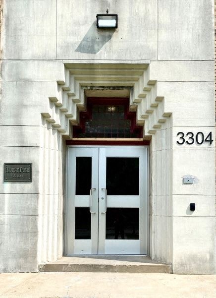 The front door of a building with the number 3304 on it.