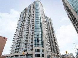 a tall building in the middle of a city