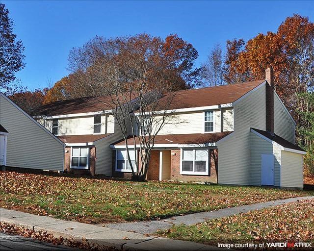a house on the side of a street
