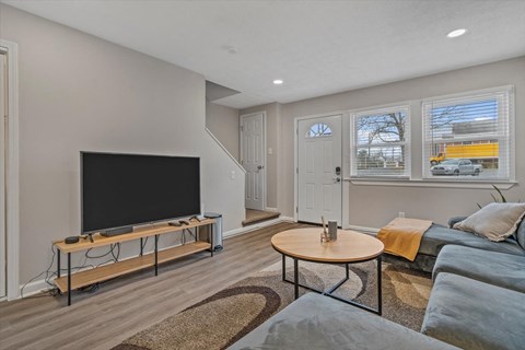 a living room with a couch and a television