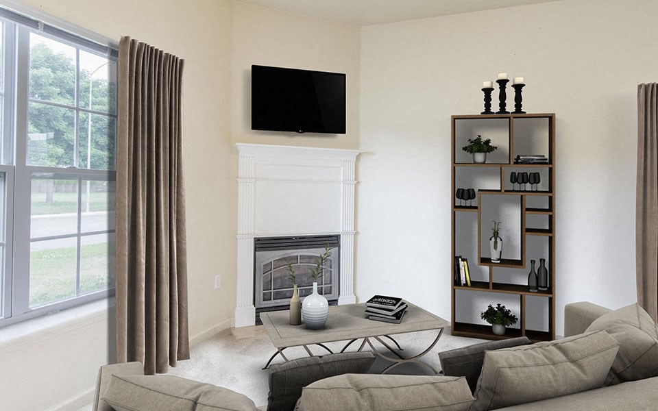 a living room with a couch and a tv