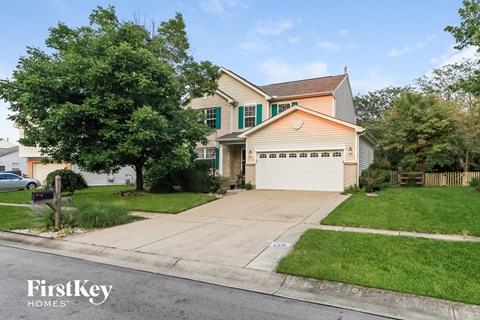 A house with a garage is for sale by FirstKey Homes.