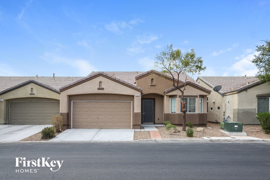 A row of houses with the words "FirstKey Homes" on the bottom left.