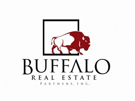 a logo with a bull in a frame
