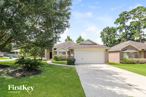 a house with a driveway and a garage door