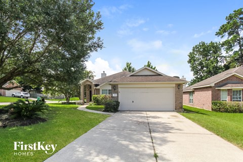 a house with a driveway and a garage door