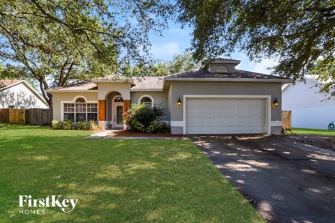 A house with a garage is for sale by FirstKey Homes.