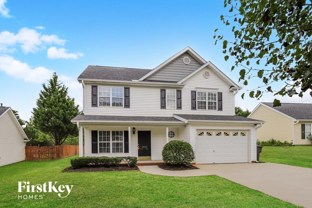 A house with a garage is for sale by FirstKey Homes.