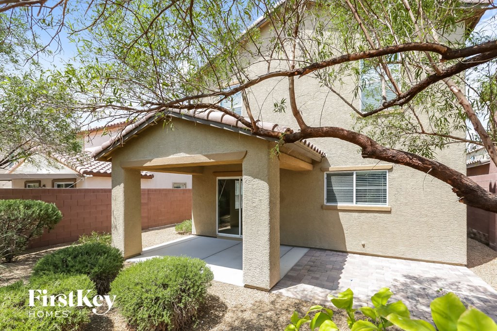 a house with a tree in front of it