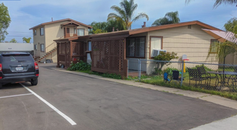 a house with a car parked in front of it