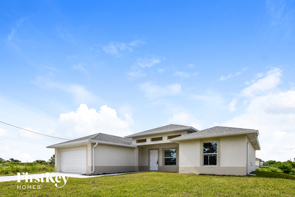 a house with a blue sky in the background