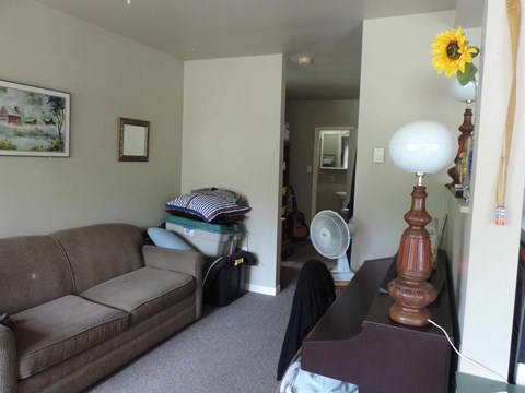 a living room with a couch and a table