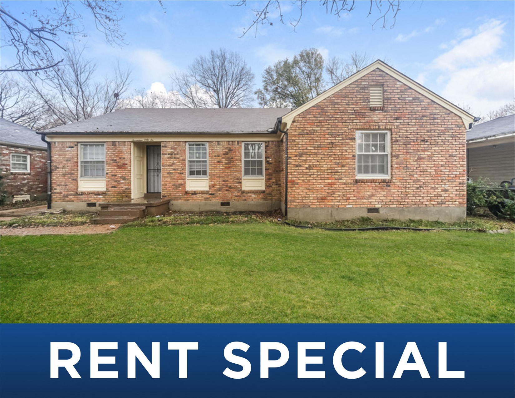 the front of a brick house with the rent special sign