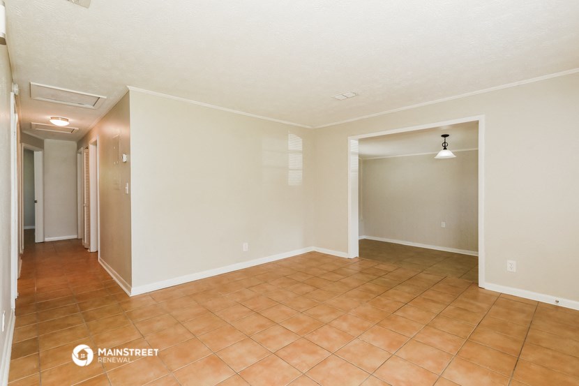 the living room and dining room are spacious and clean