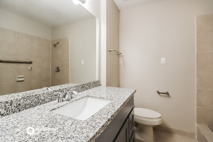 the preserve at ballantyne commons bathroom with sink toilet and shower