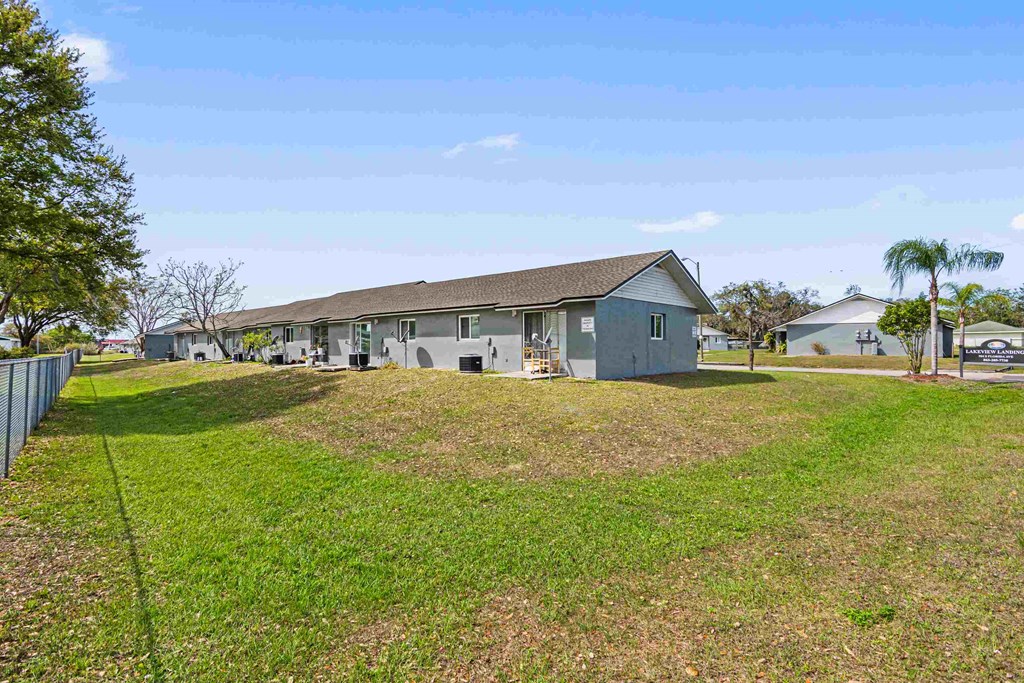 a house with a yard in front of it