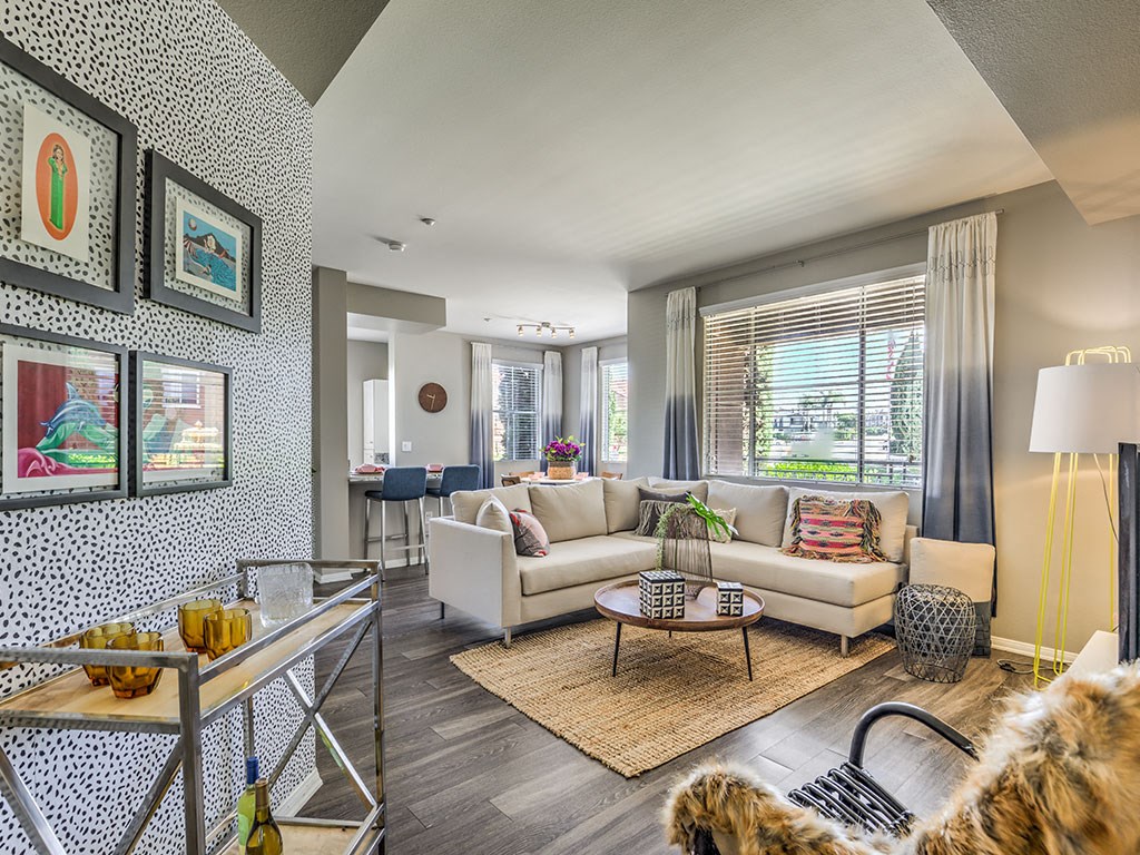 a living room with a couch and a table