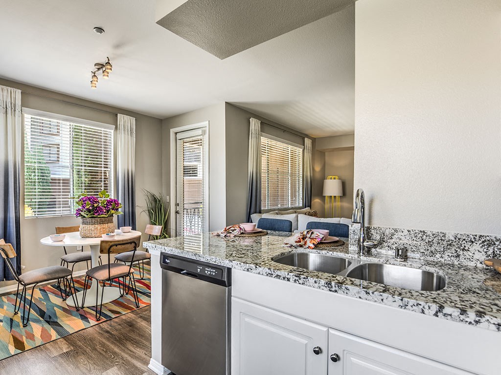 a kitchen with a sink and a counter top