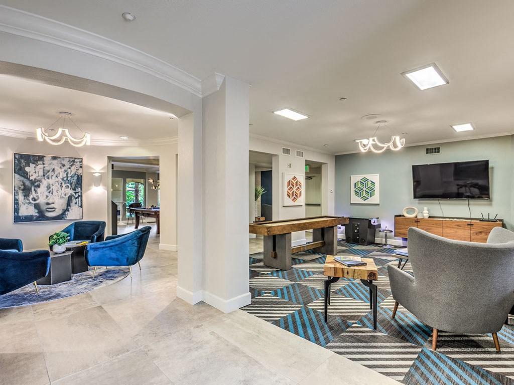 a living room with furniture and a television